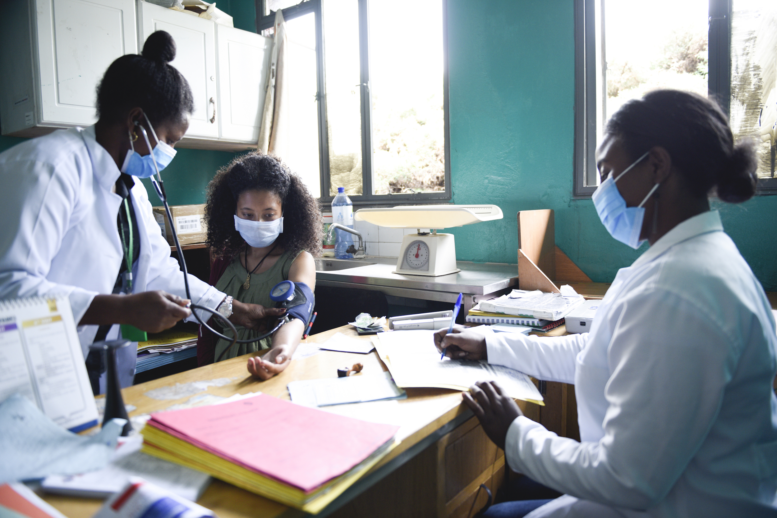 Ethiopia healthcare workers and patient wearing face masks